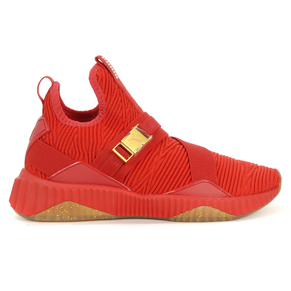 red and gold puma shoes