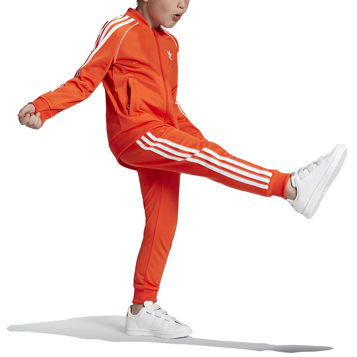 orange and white adidas tracksuit